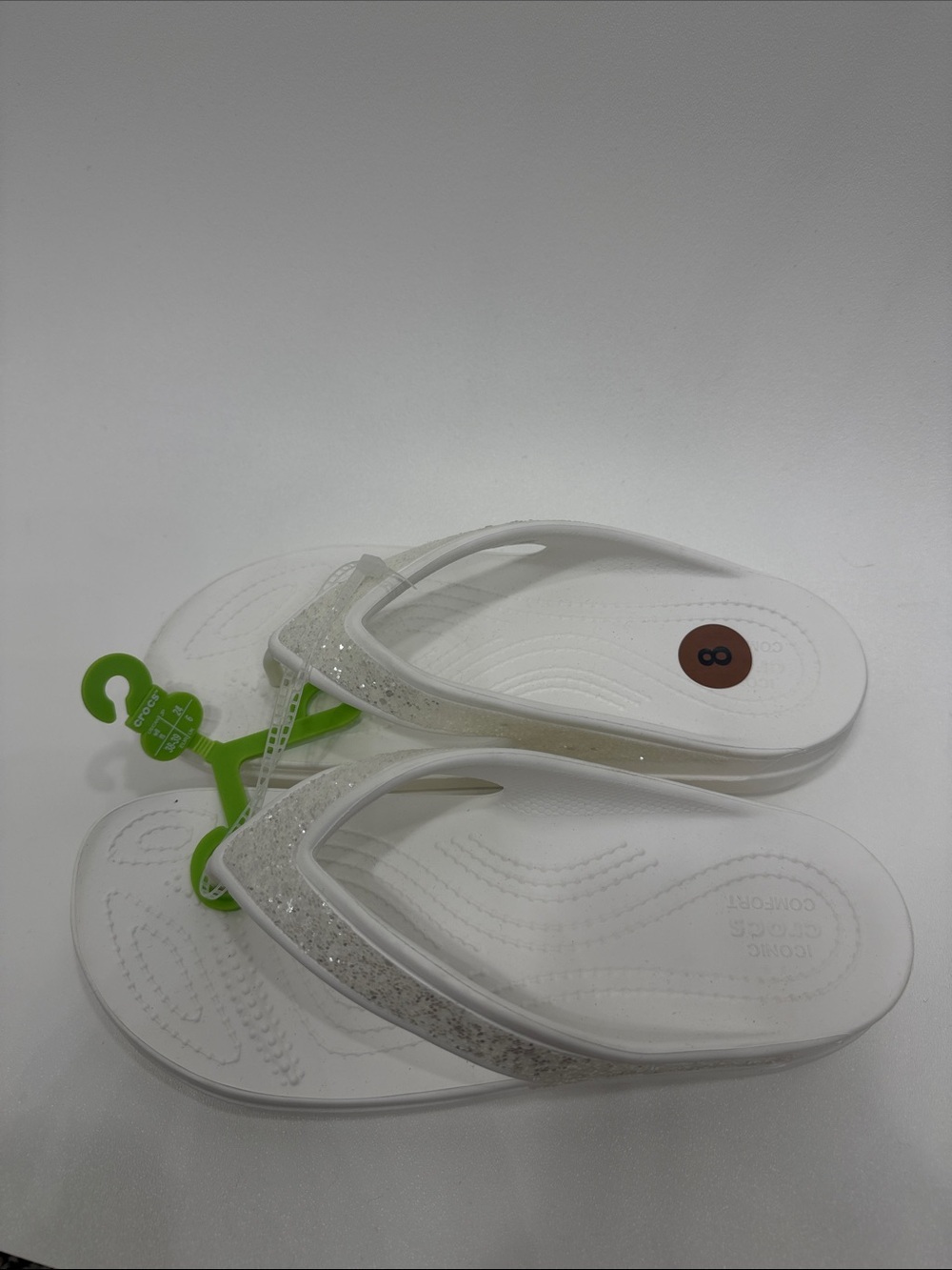Crocs Sloane White glitter flip flop sandals size 8. NWOT.